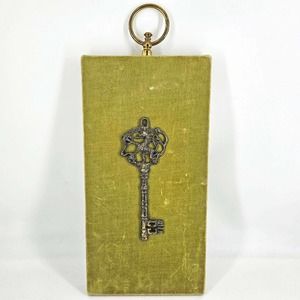 Vintage unique large skeleton key mounted on kiwi green velvet wall decor